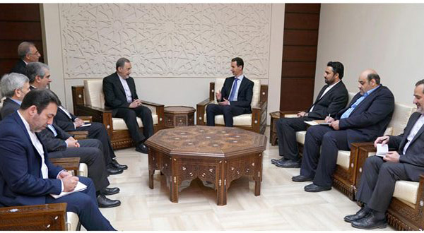 Syrian President Bashar al-Assad and Iranian Adviser Ali Akbar Velayati